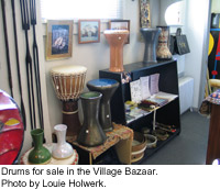 Drums for sale in the Village Bazaar.  Photo by Louie Holwerk.