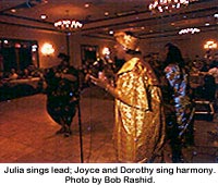 Julia sings lead; Joyce and Dorothy sing harmony. Photo by Bob Rashid.